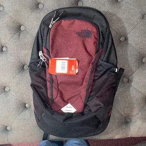 Red and black north face backpack